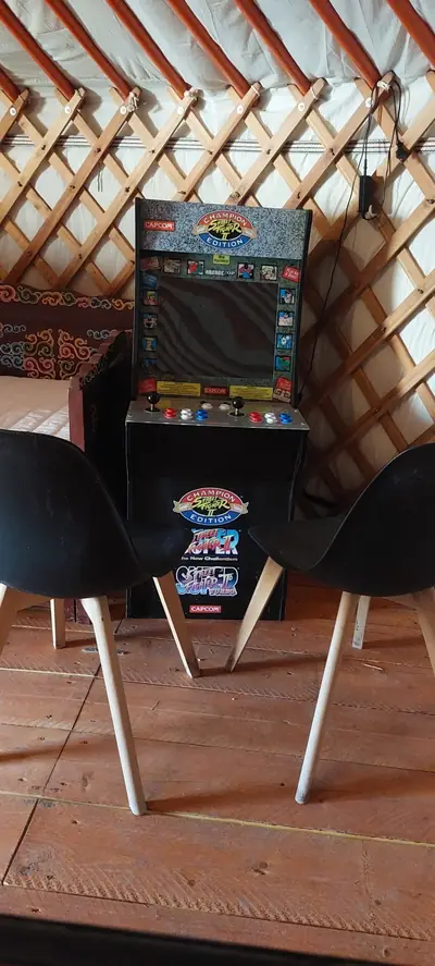 La borne d'arcade de la yourte salle de jeux